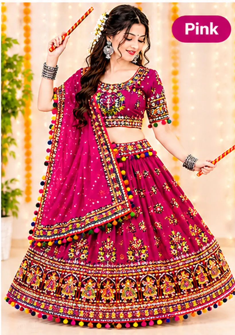 Woman dancing with dandiya sticks in a magenta pink chaniya choli with mirror work, pom-pom trim and a matching dupatta